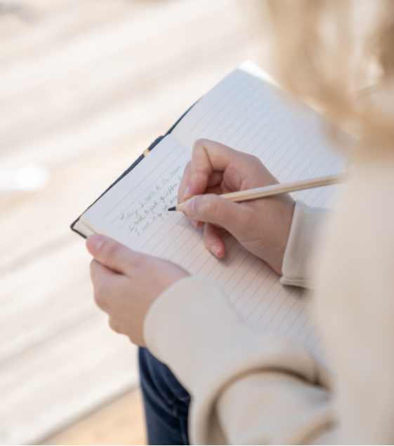 a woman journaling