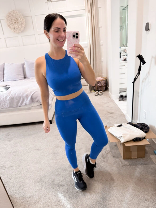 A mirror selfie of Tasha in a CRZ yoga set